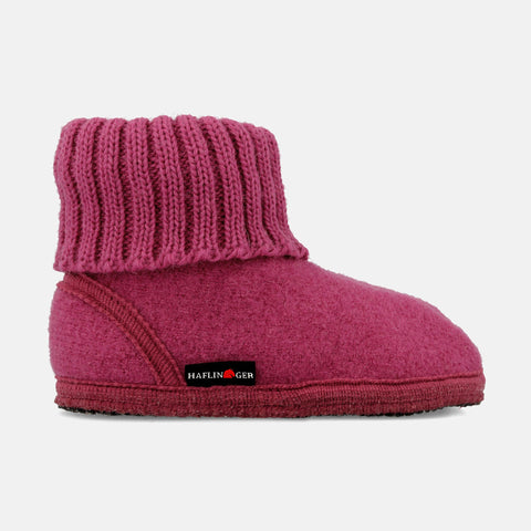 Haflinger Hüttenschuh Karl in Pink (Azalee) aus reiner Schurwolle mit Latex beschichteter Filzsohle Seitenansicht